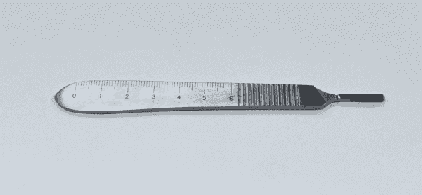 A KNIFE HANDLE #3 STANDARD on a white surface.