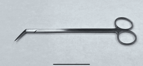 A pair of POTTS-SMITH VASCULAR SCISSORS on a white surface.