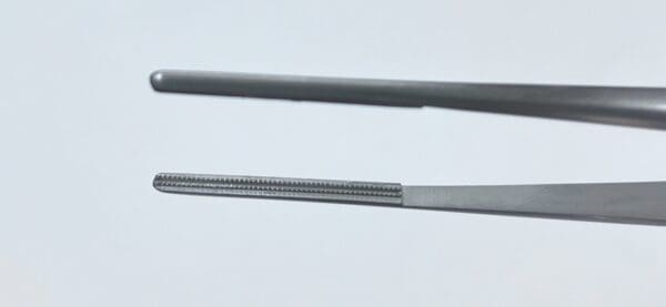 A pair of DEBAKEY VASCULAR TISSUE FORCEP, 2MM TIPS tweezers on a white background.