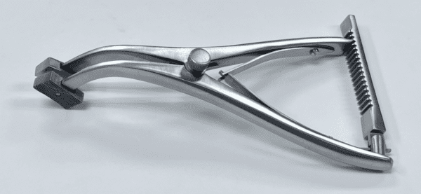 An image of a FEMORAL-TIBIAL SPREADER on a white surface.
