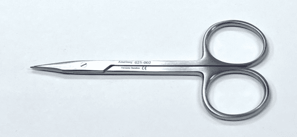 A Stevens Tenotomy Scissor with sharp tips on a white surface.