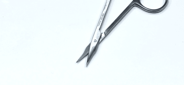 A STEVENS TENOTOMY SCISSOR, SHARP TIPS on a white surface.