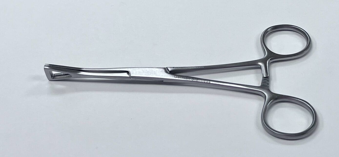 A PENNINGTON TISSUE GRASPING FORCEP on a white surface.