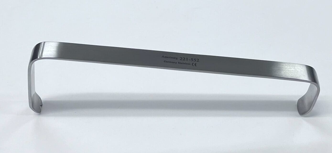 A SOFIELD RETRACTOR handle on a white surface.