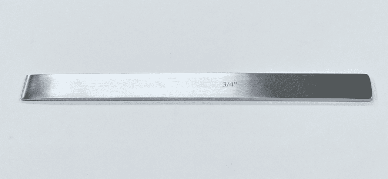 A LAMBOTTE OSTEOTOME, 9" knife on a white surface.