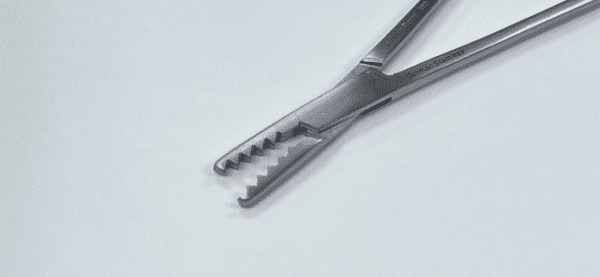 A MARTIN CARTILAGE CLAMP on a white surface.