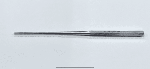 A stainless steel SPINAL AWL with a handle on a white surface.