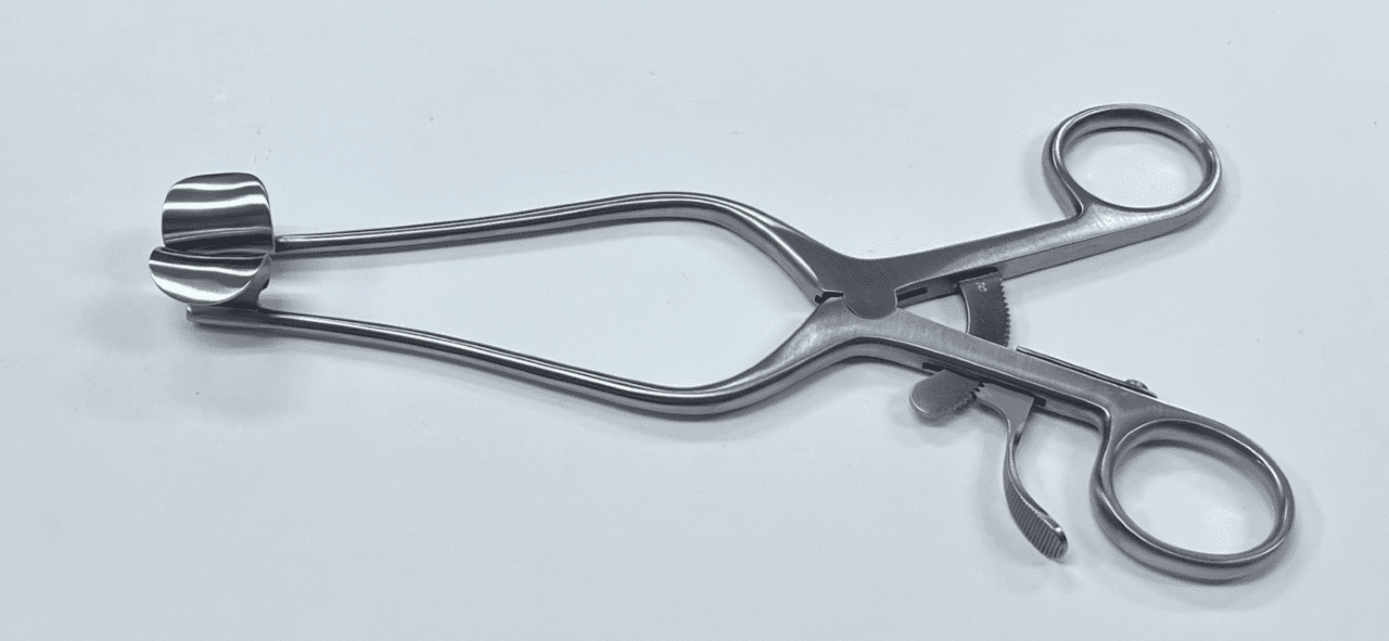 A HENDREN TYPE SELF RETAINING RETRACTOR on a white surface.