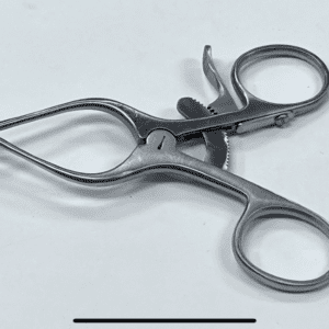 A Wilson Type Trigger Finger Retractor on a white surface.