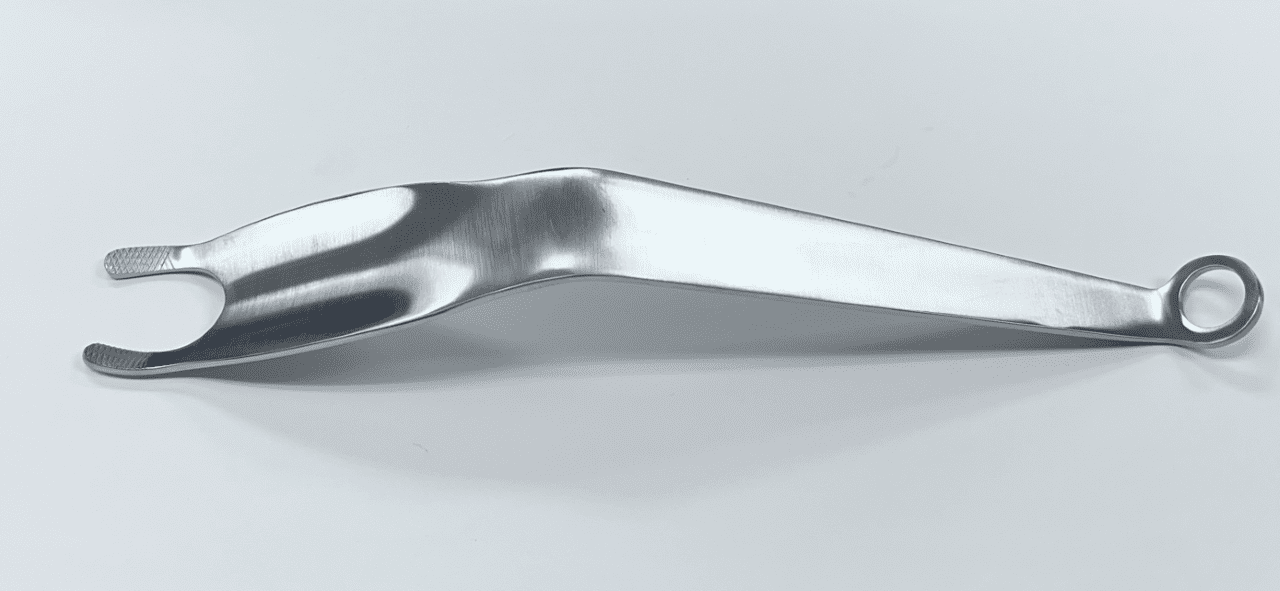 A FEMORAL ELEVATOR, PROXIMAL, NARROW, STANDARD PRONGS utensil holder on a white surface.
