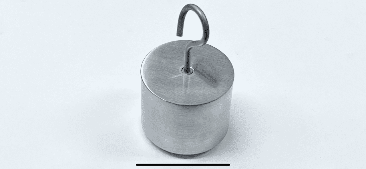 An image of a MODULAR WEIGHTS with a hook on it.