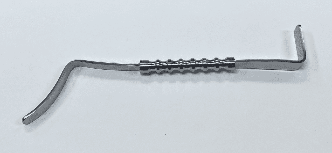 A KNEE RETRACTOR, ROSEN TYPE with a handle on a white surface.