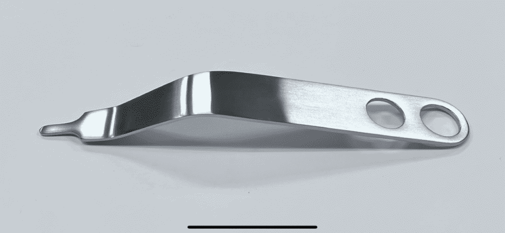 An image of a HOHMANN RETRACTOR, REVERSE, EVANS TYPE handle on a white surface.
