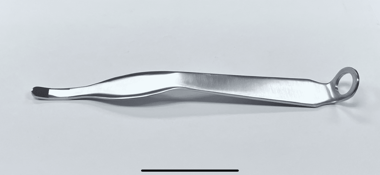 A HOHMANN RETRACTOR with a handle on a white surface.