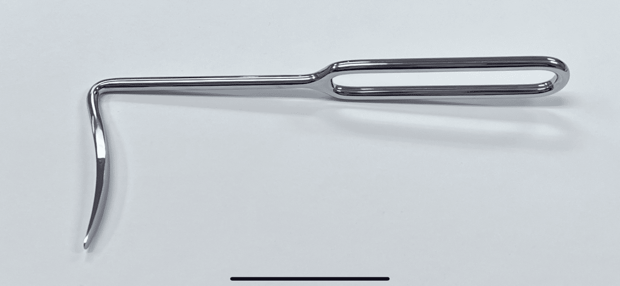 A stainless steel Knee Retractor, Blunt with a handle on a white surface.