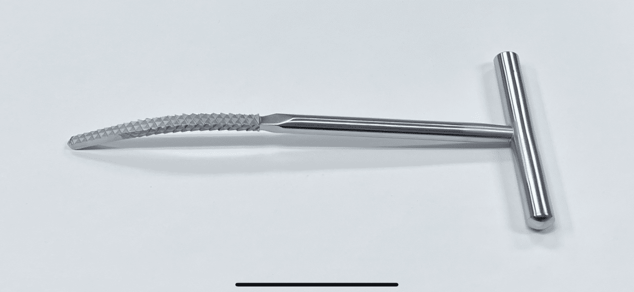 A FEMORAL CANAL FINDER/RASP, T-HANDLE, ROCKOWITZ TYPE tweezers on a white surface.