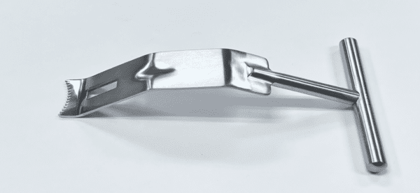 A FUKUDA RETRACTOR, MODIFIED, EVANS TYPE stainless steel tool with a handle attached to it.