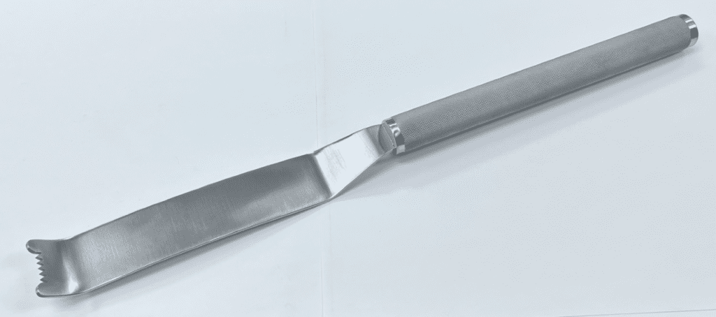 A Femoral Neck Elevator, Extra Leverage stainless steel spatula on a white surface.
