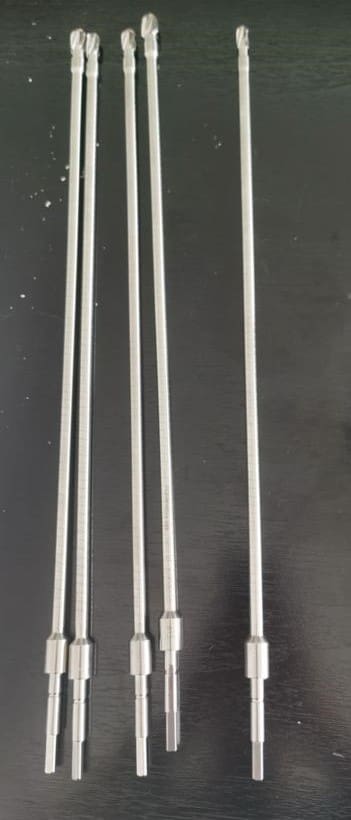 Four FLEXIBLE REAMERS on a table.