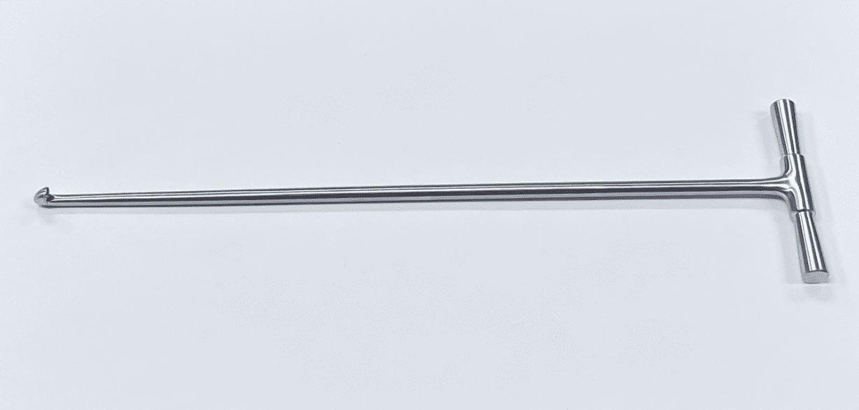 A Retrograde curette, sharp with white background