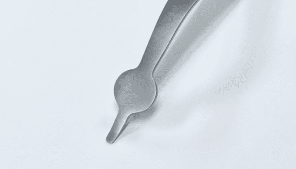 A COLLATERAL RETRACTOR on a white background.