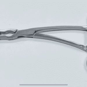 A pair of meniscal clamps on a white surface.