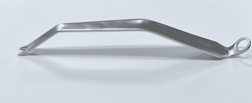 A HOHMANN RETRACTOR, DOUBLE PRONG, DOUBLE BENT handle on a white surface.