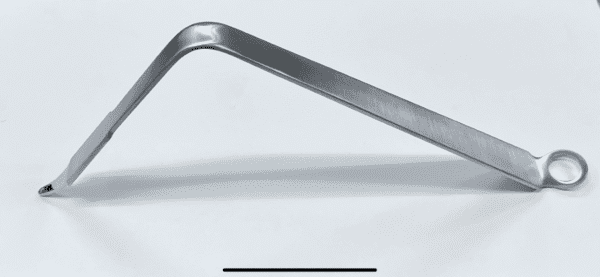 A photo of a Hohmann retractor, bent, narrow, extra deep on a white surface.