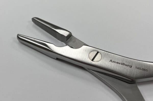A pair of PLIER, FLAT NOSE, CUTTER on a white surface.