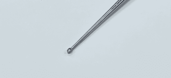 A BRUNS SPINAL FUSION CURETTE, STRAIGHT 9" is sitting on a white surface.