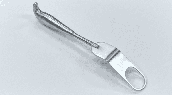 A FUKUDA RETRACTOR, MODIFIED WITH COMFORT HANDLE with a handle on a white background.
