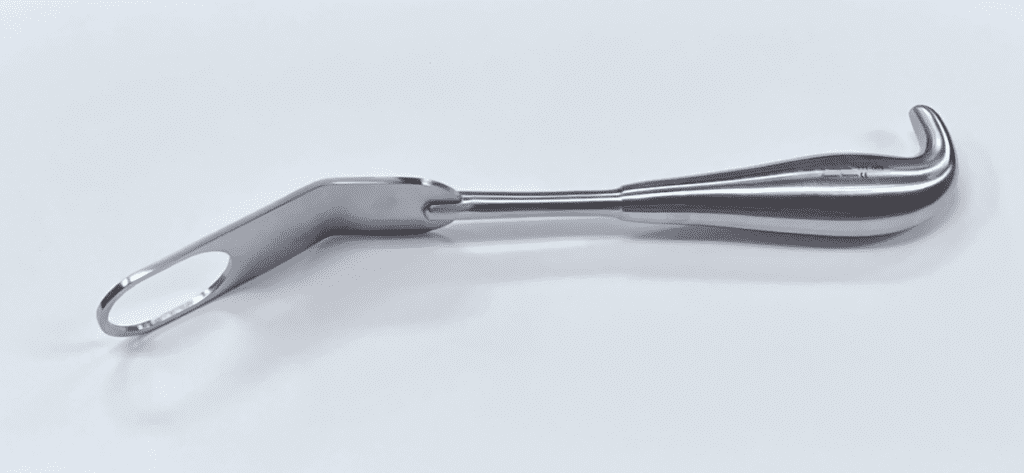 A FUKUDA RETRACTOR, MODIFIED WITH COMFORT HANDLE, on a white surface.