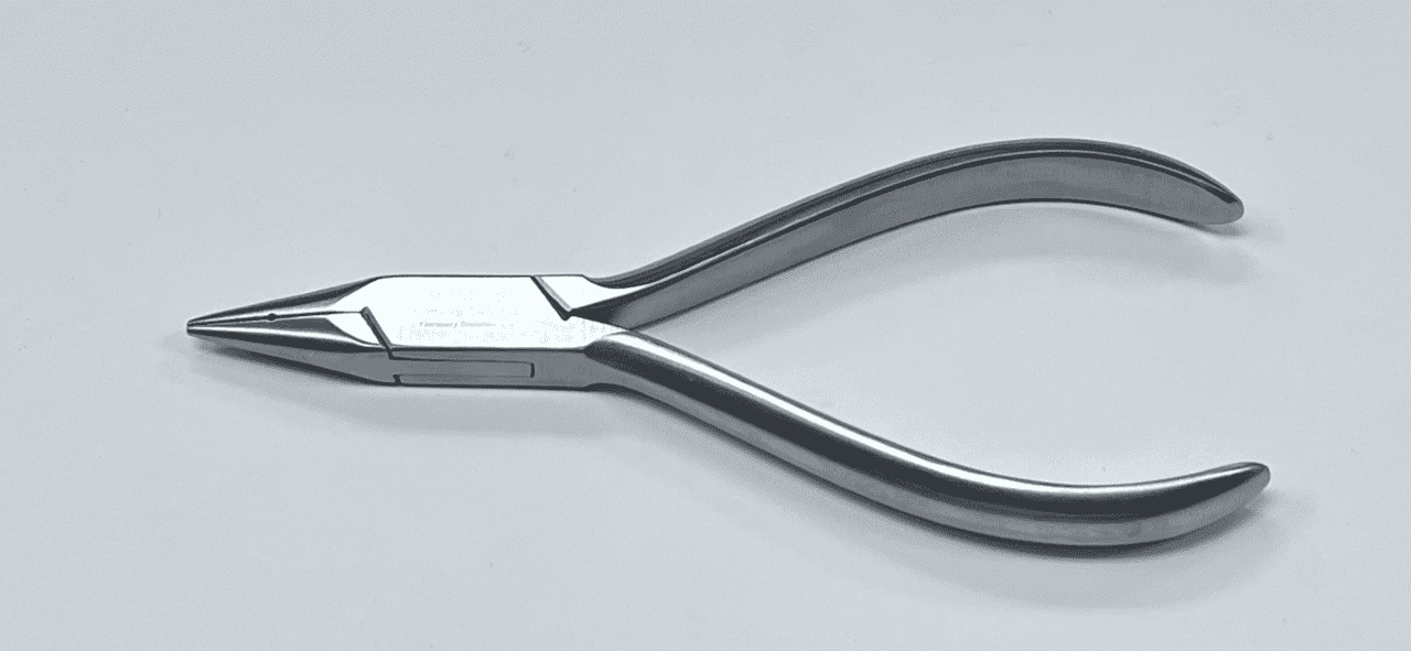 A pair of PLIER, NEEDLE NOSE on a white surface.