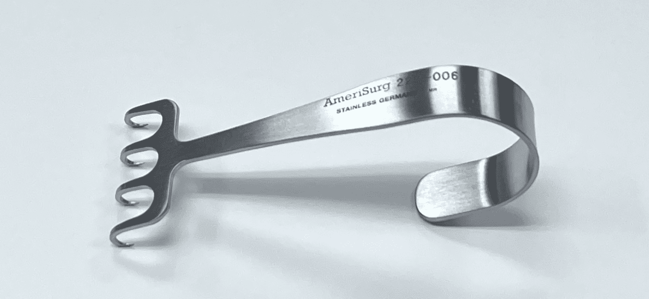 A MAXWELL FLAP RETRACTOR with a handle on it.