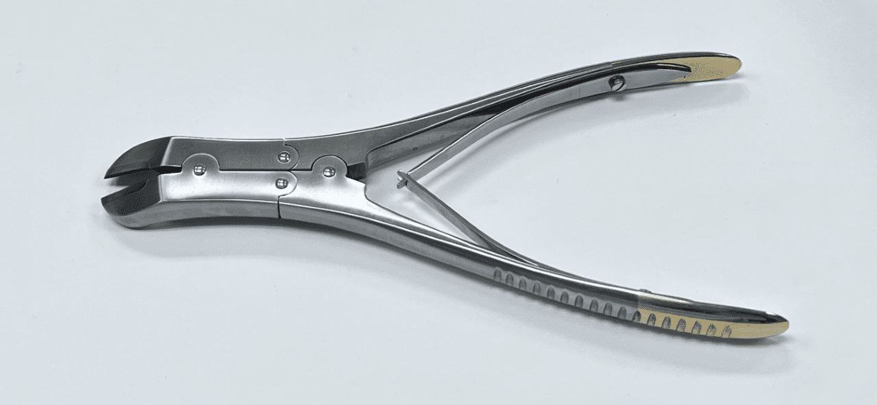 A pair of TC SIDE CUTTER pliers on a white surface.