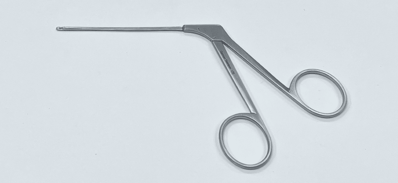 A OVAL CUP FORCEP on a white surface.
