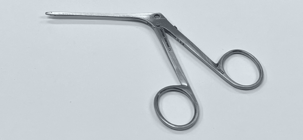 House Mini Forceps Placed on a White Background