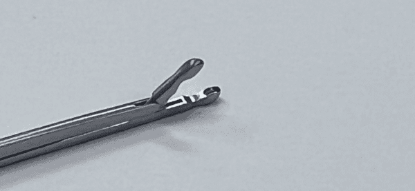 A HOUSE-WULLSTEIN MINIATURE CUP FORCEP on a white surface.