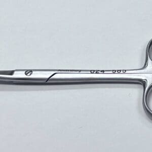 A UTILITY SCISSOR on a white surface.