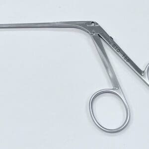 An OVAL CUP FORCEP on a white surface.
