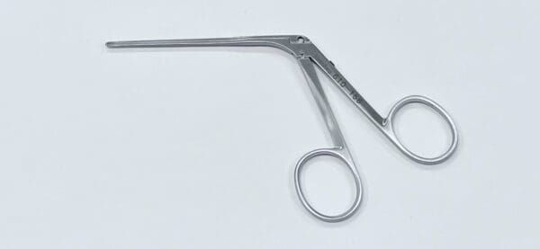An OVAL CUP FORCEP on a white surface.