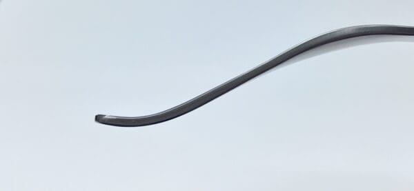 A HUMERAL HEAD RETRACTOR on a white surface.