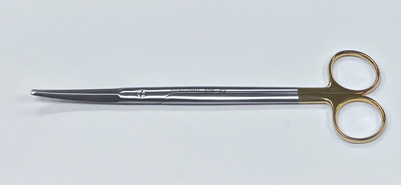 A pair of TC GORNEY FACE LIFT SCISSOR on a white surface.