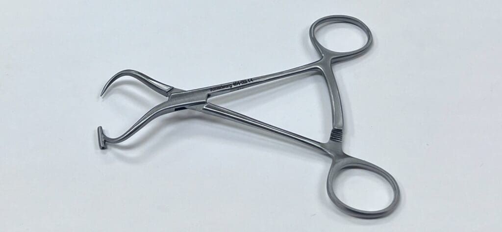 A close up of a BONE REDUCTION FORCEP.