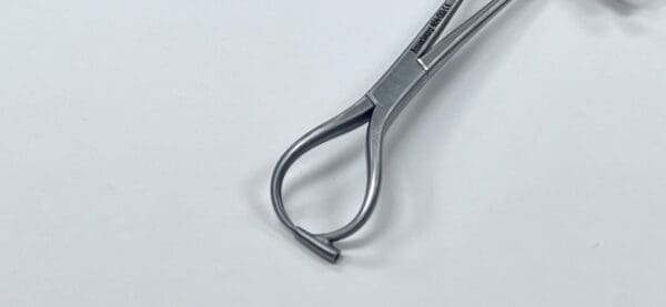 A pair of Bone Reduction Forceps on a white surface.