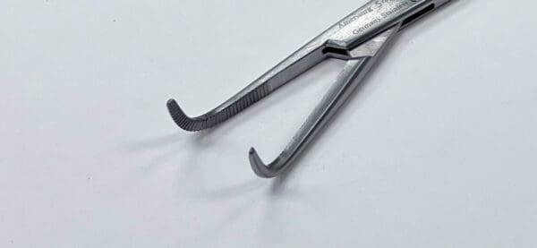 A pair of KANTROWITZ THORACIC FORCEP on a white surface.