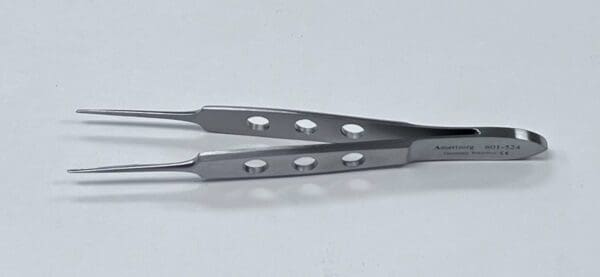 A pair of BISHOP-HARMON DRESSING FORCEP on a white surface.