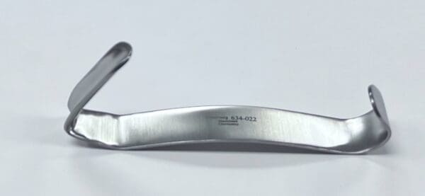 A silver CONVERSE NASAL RETRACTOR with a white background.