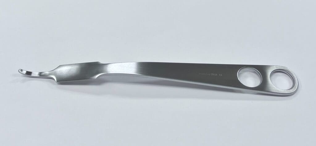 A HOHMANN RETRACTOR, 18MM, STANDARD, LONG TIP with a handle on a white surface.