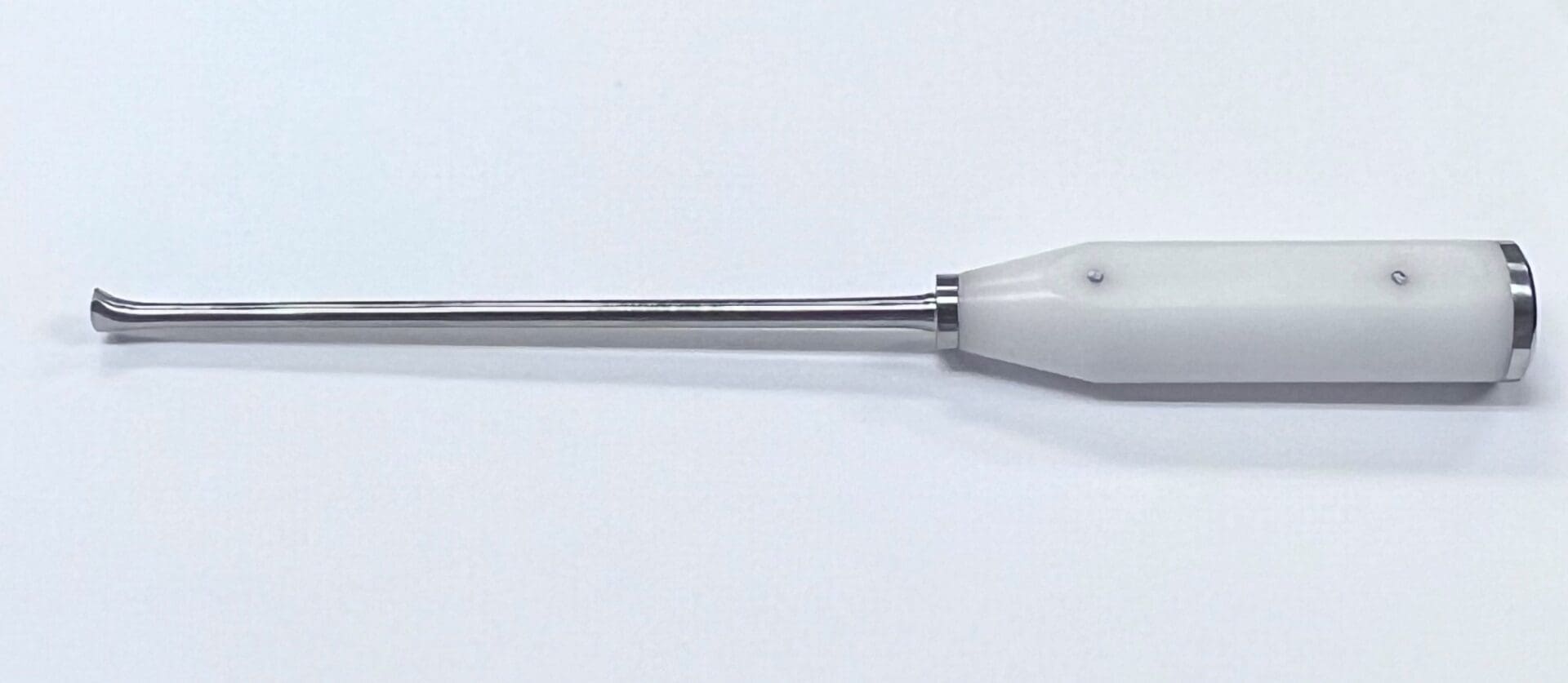 A MORELAND TYPE ACETABULAR PUNCH plastic tube on a white surface.